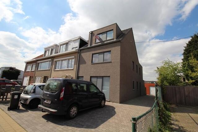 Dakappartement met groot terras en parkeerplaats