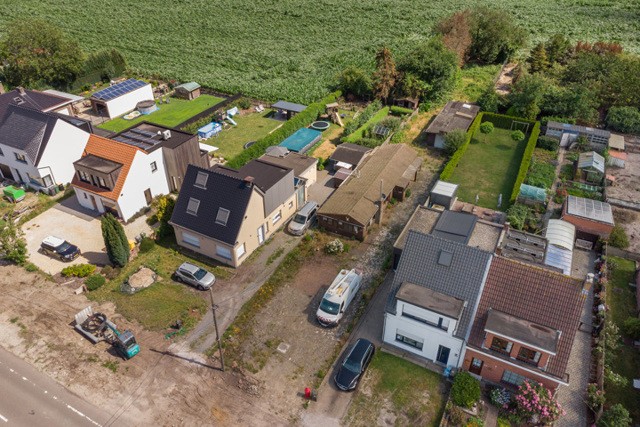 Bouwgrond – 590 m² – Open bebouwing met aansluitende garage